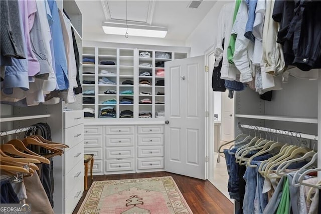 4356 N Buckhead Dr NE, Atlanta, GA 30342 - spacious closet featuring dark wood-type flooring and attic access