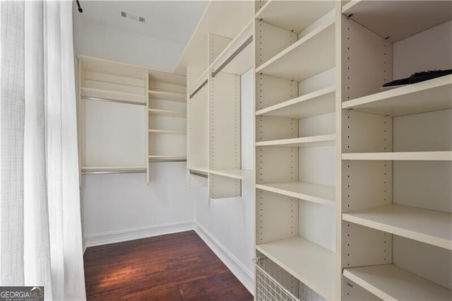 4356 N Buckhead Dr NE, Atlanta, GA 30342 - walk in closet with dark wood-style flooring