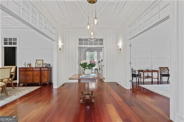 4356 N Buckhead Dr NE, Atlanta, GA 30342 - entryway with a decorative wall, wood finished floors, ornamental molding, and coffered ceiling