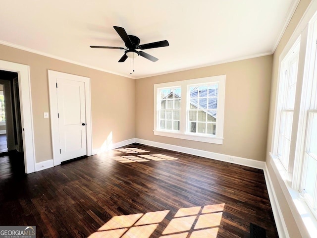 125 Oak Ave, Carrollton, GA 30117 - unfurnished room with wood finished floors, healthy amount of natural light, baseboards, and ornamental molding