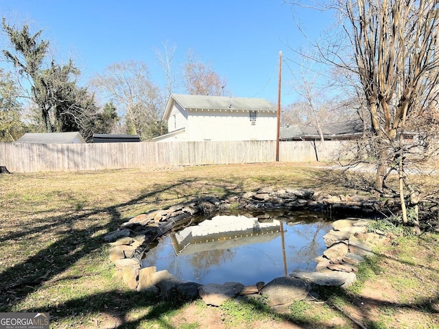 125 Oak Ave, Carrollton, GA 30117 - view of yard featuring a small pond