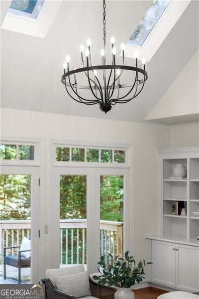 3600 Goldenrod Dr, Alpharetta, GA 30005 - dining area with a skylight, a chandelier, and high vaulted ceiling