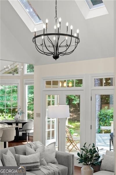 3600 Goldenrod Dr, Alpharetta, GA 30005 - sunroom with a skylight, a chandelier, and vaulted ceiling