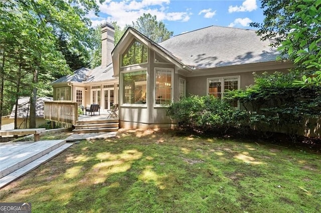 3600 Goldenrod Dr, Alpharetta, GA 30005 - rear view of property with a chimney, a deck, a yard, and stucco siding