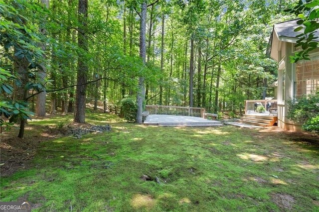 3600 Goldenrod Dr, Alpharetta, GA 30005 - view of green lawn featuring a wooden deck
