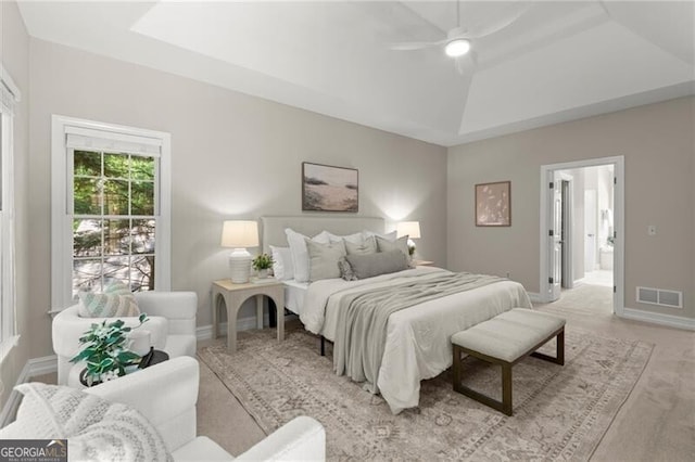 3600 Goldenrod Dr, Alpharetta, GA 30005 - bedroom with baseboards, light colored carpet, ensuite bath, a tray ceiling, and ceiling fan