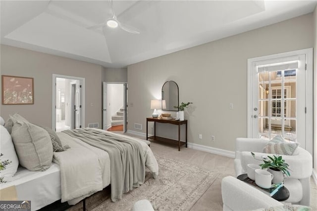 3600 Goldenrod Dr, Alpharetta, GA 30005 - carpeted bedroom featuring a raised ceiling, baseboards, connected bathroom, and a ceiling fan