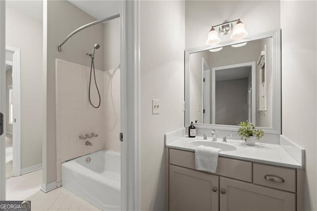 3600 Goldenrod Dr, Alpharetta, GA 30005 - full bath with shower / bathtub combination, vanity, tile patterned flooring, and baseboards
