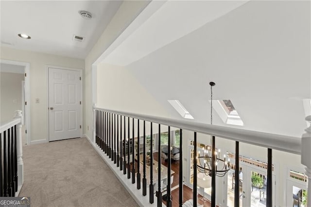 3600 Goldenrod Dr, Alpharetta, GA 30005 - corridor with a skylight, light carpet, healthy amount of natural light, a chandelier, and recessed lighting