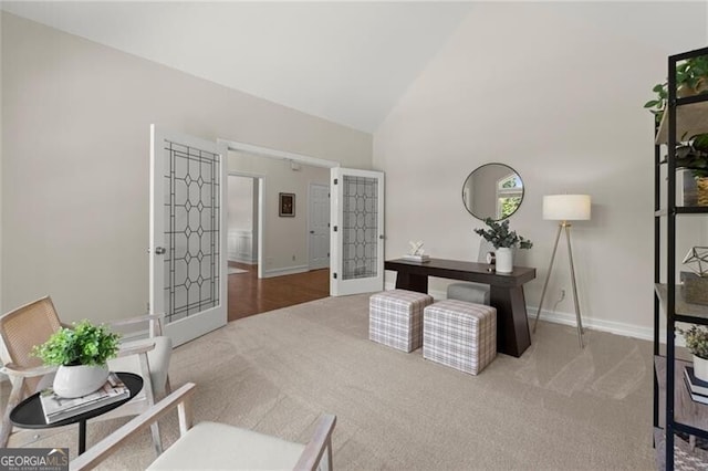 3600 Goldenrod Dr, Alpharetta, GA 30005 - living area with carpet flooring, baseboards, a desk, and high vaulted ceiling
