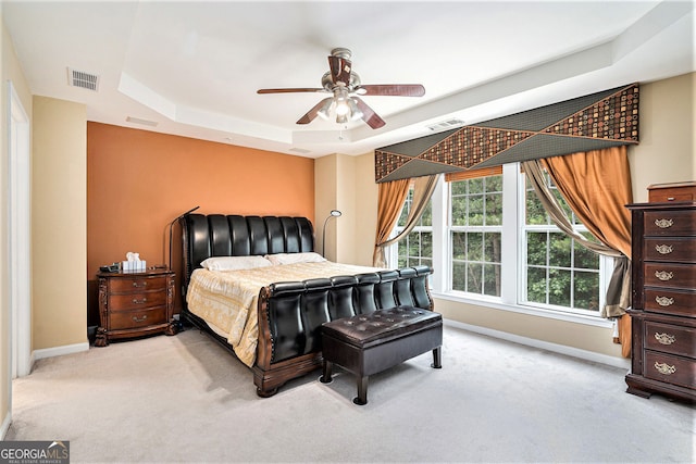 129 Finsbury Ln, Woodstock, GA 30188 - bedroom featuring a tray ceiling, baseboards, carpet floors, and ceiling fan