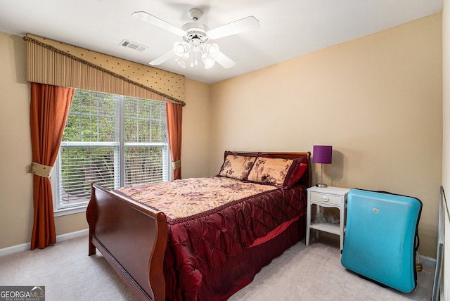 129 Finsbury Ln, Woodstock, GA 30188 - carpeted bedroom featuring multiple windows, baseboards, and a ceiling fan