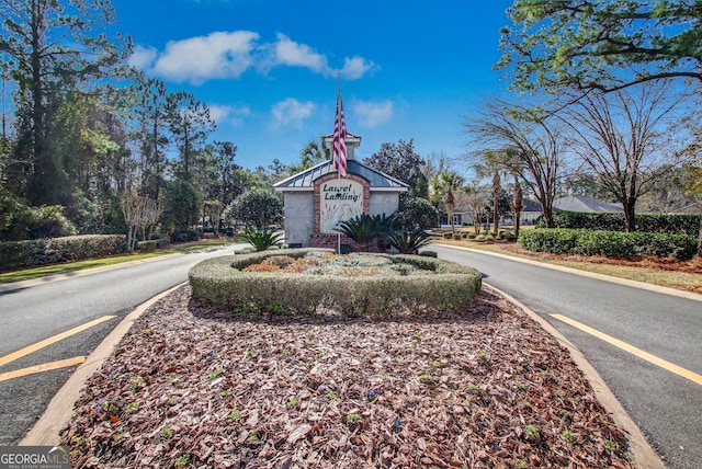 247 Laurel Landing Blvd, Kingsland, GA 31548 - view of asphalt road featuring curbs