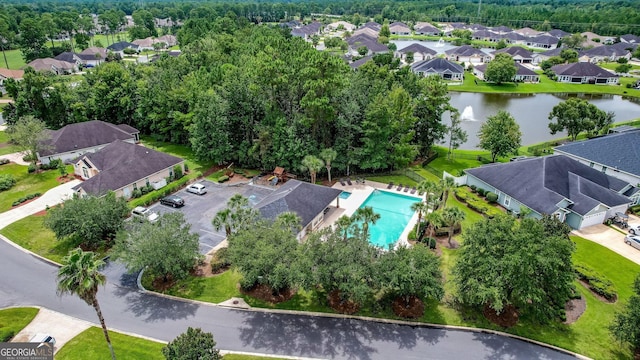 247 Laurel Landing Blvd, Kingsland, GA 31548 - aerial view of property and surrounding area with nearby suburban area, a nearby body of water, and a pool