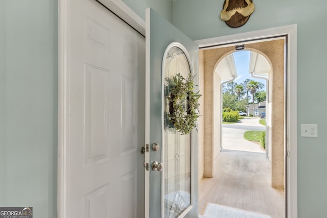 247 Laurel Landing Blvd, Kingsland, GA 31548 - entryway with arched walkways and wood finished floors