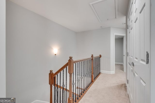 2325 Limehurst Dr NE, Atlanta, GA 30319 - corridor with attic access, carpet flooring, baseboards, and an upstairs landing