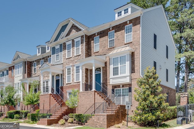 2325 Limehurst Dr NE, Atlanta, GA 30319 - view of property with brick siding and stairs