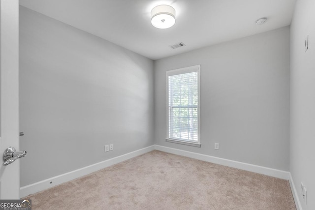 2325 Limehurst Dr NE, Atlanta, GA 30319 - carpeted empty room with baseboards and a smoke detector