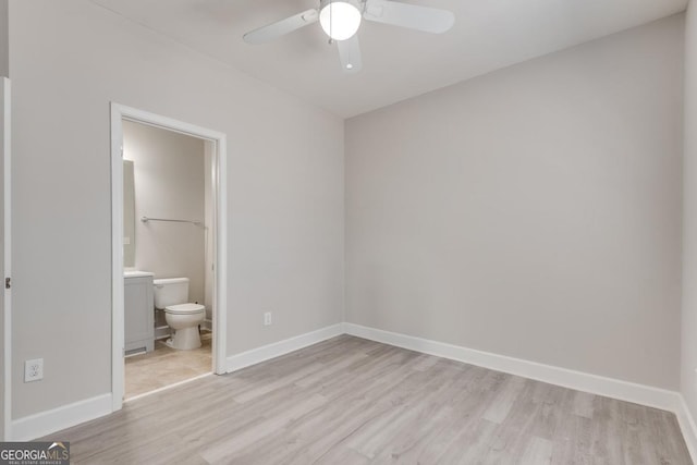2325 Limehurst Dr NE, Atlanta, GA 30319 - unfurnished bedroom featuring light wood-style floors, baseboards, ensuite bath, and ceiling fan