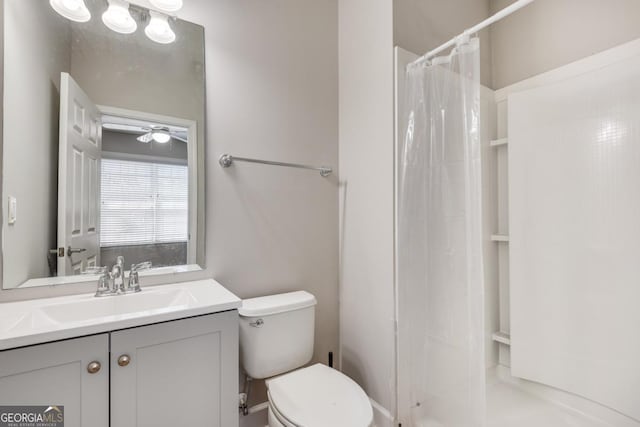 2325 Limehurst Dr NE, Atlanta, GA 30319 - bathroom with vanity, toilet, curtained shower, and ceiling fan
