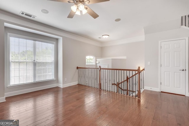 2325 Limehurst Dr NE, Atlanta, GA 30319 - spare room with ceiling fan, healthy amount of natural light, crown molding, and hardwood / wood-style flooring