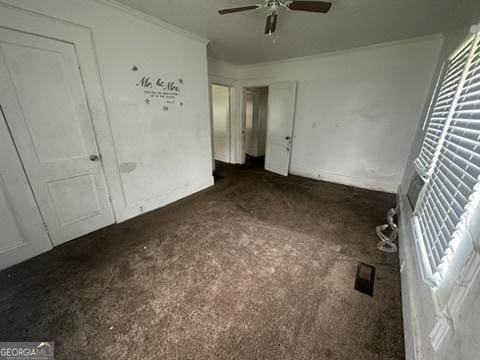 146 Carter St, Carrollton, GA 30117 - unfurnished bedroom featuring carpet flooring, crown molding, baseboards, and a ceiling fan