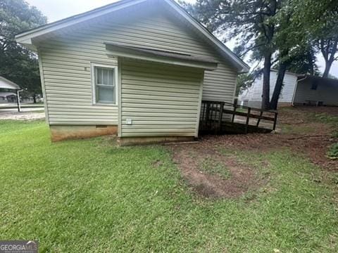 146 Carter St, Carrollton, GA 30117 - view of side of property featuring a yard and crawl space