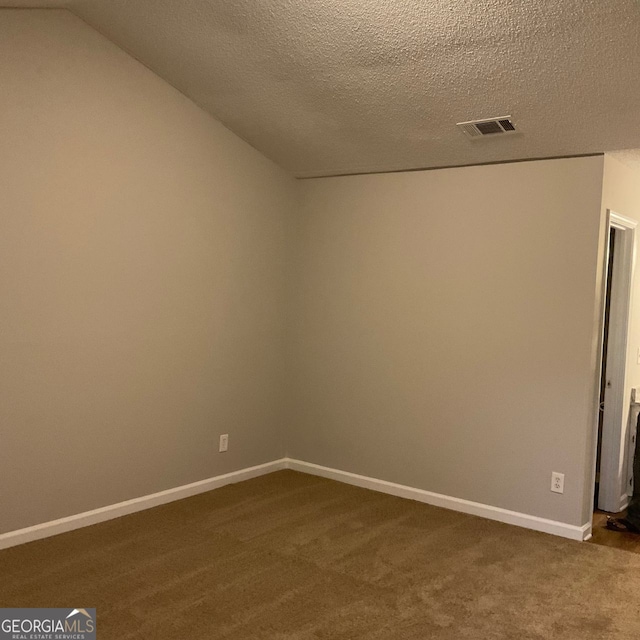 233 Winterville, Rockmart, GA 30153 - empty room with dark carpet and a textured ceiling