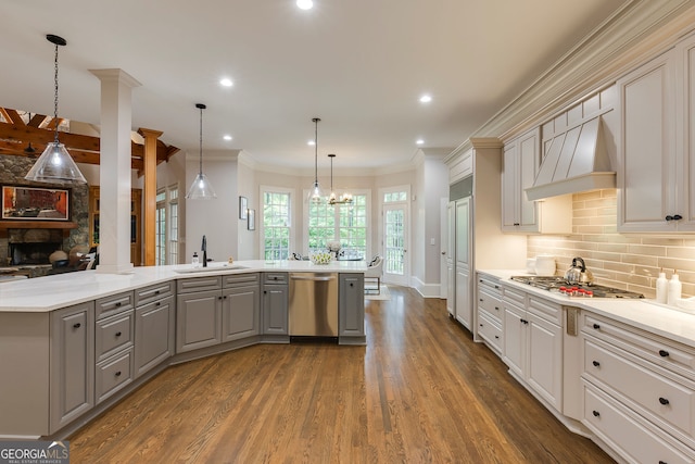 314 Caruso Ct, Sandy Springs, GA 30350 - kitchen featuring gray cabinetry, appliances with stainless steel finishes, custom exhaust hood, backsplash, and dark wood-style floors