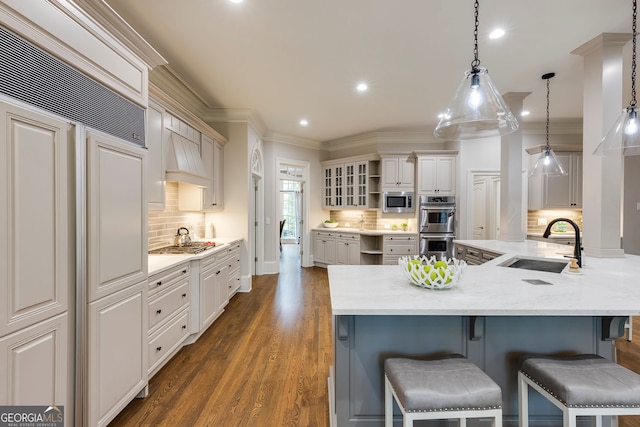 314 Caruso Ct, Sandy Springs, GA 30350 - kitchen featuring built in appliances, open shelves, a breakfast bar area, recessed lighting, and decorative backsplash
