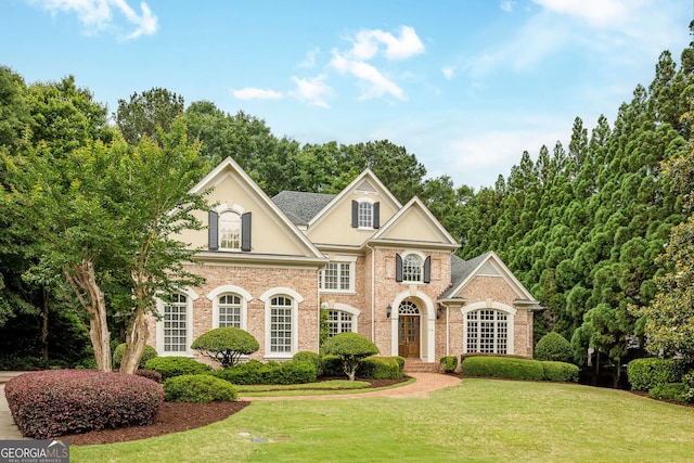 314 Caruso Ct, Sandy Springs, GA 30350 - view of front of home with a front yard and stucco siding