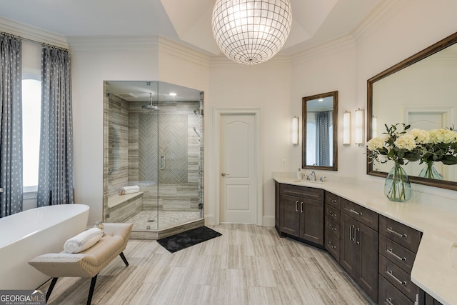 314 Caruso Ct, Sandy Springs, GA 30350 - bathroom featuring a shower stall, a freestanding tub, vanity, a chandelier, and ornamental molding
