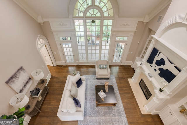 314 Caruso Ct, Sandy Springs, GA 30350 - living room featuring crown molding, dark wood-style floors, and a premium fireplace