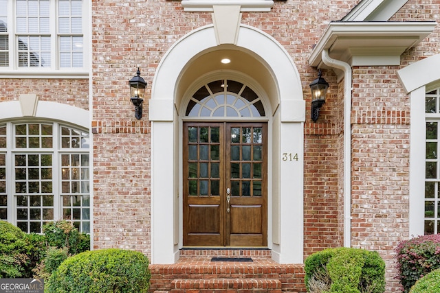 314 Caruso Ct, Sandy Springs, GA 30350 - view of exterior entry with french doors and brick siding