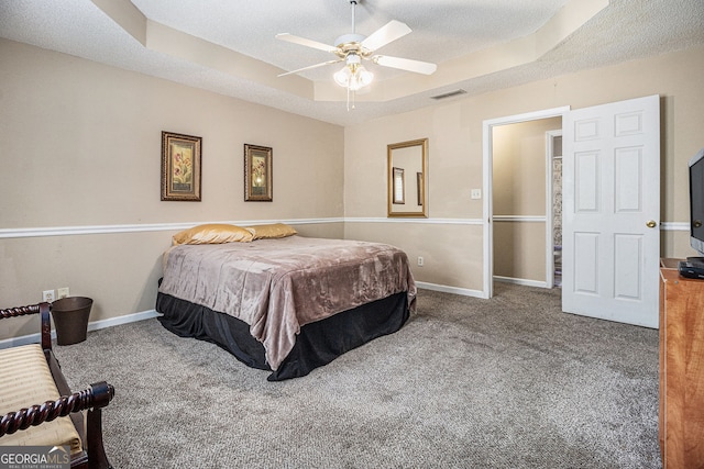 7008 Glen Valley Way, Fairburn, GA 30213 - carpeted bedroom with a textured ceiling, baseboards, and a ceiling fan