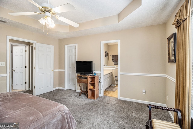 7008 Glen Valley Way, Fairburn, GA 30213 - bedroom featuring carpet floors, baseboards, ensuite bathroom, a textured ceiling, and ceiling fan