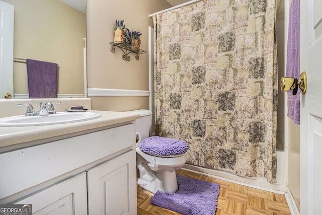 7008 Glen Valley Way, Fairburn, GA 30213 - full bath featuring toilet, vanity, and shower / bath combo with shower curtain