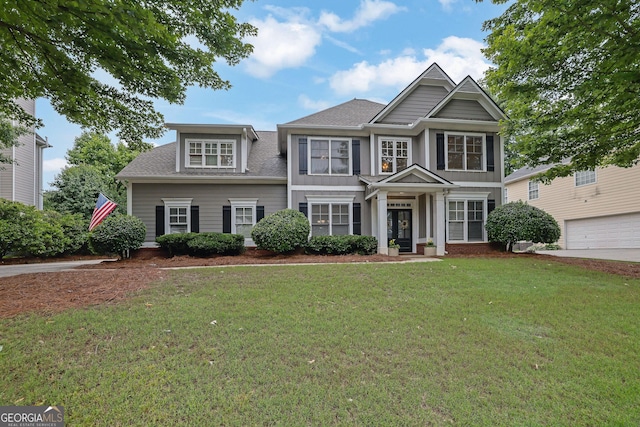 4218 Sandy Branch Dr, Buford, GA 30519 - view of front of home with a front lawn and roof with shingles