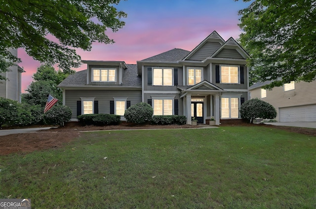 4218 Sandy Branch Dr, Buford, GA 30519 - view of front of house with a lawn and roof with shingles