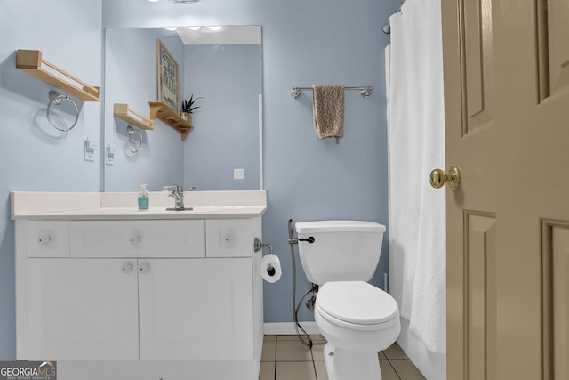 4218 Sandy Branch Dr, Buford, GA 30519 - bathroom with tile patterned flooring, vanity, toilet, a shower with shower curtain, and baseboards