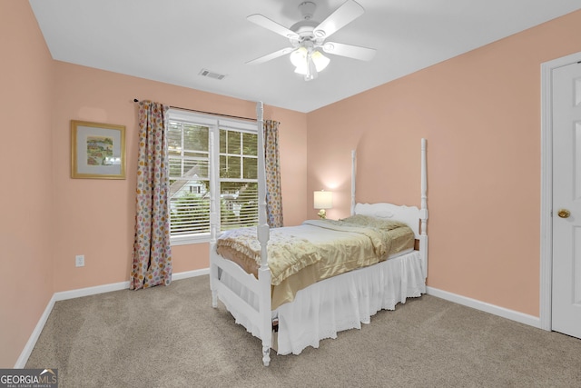 4218 Sandy Branch Dr, Buford, GA 30519 - bedroom featuring baseboards, light carpet, and ceiling fan