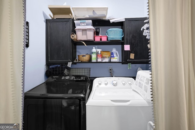 4218 Sandy Branch Dr, Buford, GA 30519 - laundry area with separate washer and dryer and cabinet space