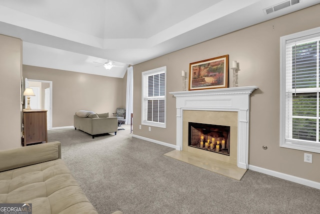 4218 Sandy Branch Dr, Buford, GA 30519 - living area with carpet floors, ceiling fan, a fireplace, and baseboards