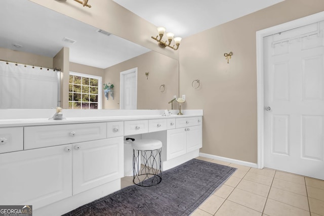4218 Sandy Branch Dr, Buford, GA 30519 - full bath with double vanity, tile patterned flooring, and baseboards