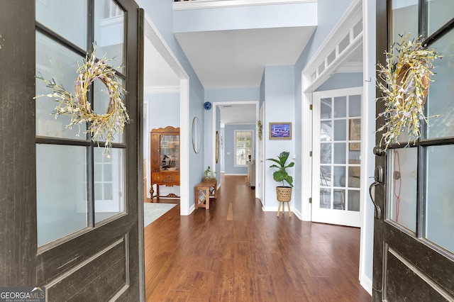 4218 Sandy Branch Dr, Buford, GA 30519 - foyer entrance featuring wood finished floors and baseboards