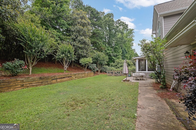4218 Sandy Branch Dr, Buford, GA 30519 - view of grassy yard with a patio area