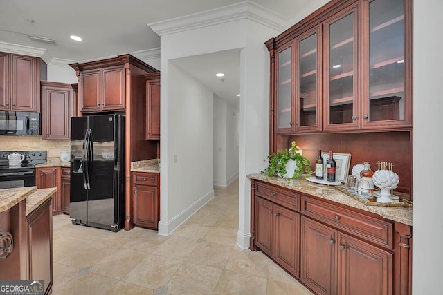 3100 Prince Ln, Saint Simons, GA 31522 - kitchen featuring black appliances, decorative backsplash, light stone counters, glass insert cabinets, and recessed lighting