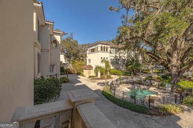 3100 Prince Ln, Saint Simons, GA 31522 - view of community with a swimming pool and a patio area