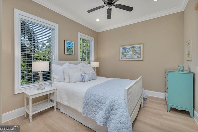 3100 Prince Ln, Saint Simons, GA 31522 - bedroom with wood finished floors, crown molding, baseboards, recessed lighting, and a ceiling fan