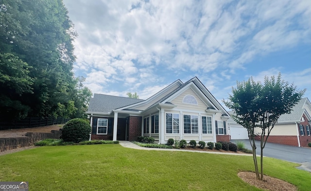 1535 Duluth Hwy Unit 1101, Lawrenceville, GA 30043 - single story home with brick siding, a front lawn, concrete driveway, and a garage